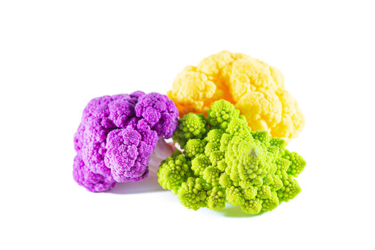 Fresh multicolored cauliflower isolated on a white background. Purple, green, and yellow florets.