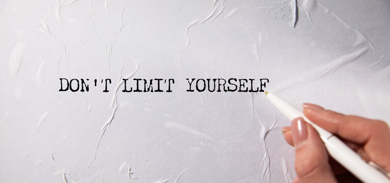 Don't limit yourself - writing on torn paper.