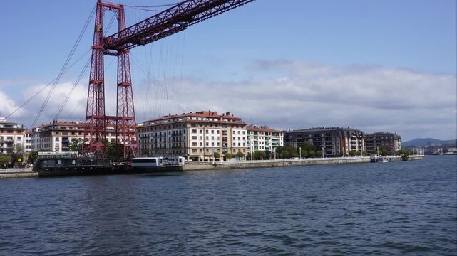 The gondola of the Vizcaya transporter bridge leaving the far bank.