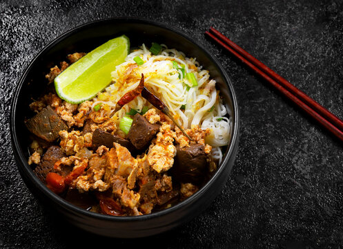 Rice Vermicelli with Northern Thai Curry Sauce (Khanom Chin Nam Ngiao) is a local dish from Northern Thailand.