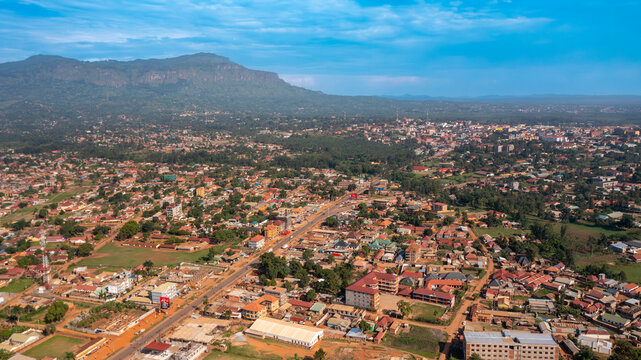 Aerial view of the city of Mbale nestled at the foot of Mount Elgon with urban development, residential buildings, and roads in Mbale, Eastern Region, Uganda.