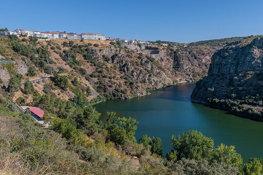 Arribes del Duero and buildings of the Portuguese town of Miranda do Douro, Portugal. Arribes del Duero Natural Park. Duero River.