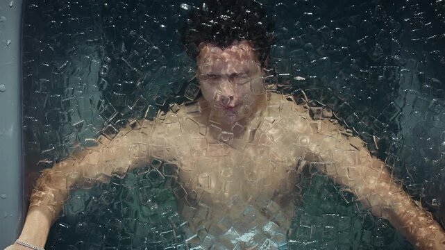 Man in ice bath practicing cold plunge breathing for recovery and wellness