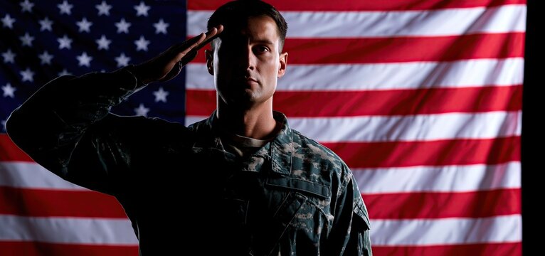 A soldier saluting in silhouette stands before a colorful flag, symbolizing honor and patriotic pride.
