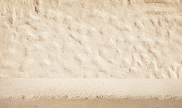 Close-up of a stucco top,wall with a rough, irregular texture and subtle shadows creating a natural, organic pattern
