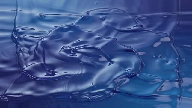 Abstract Blue Liquid Water Surface Waves and Ripple Motion.