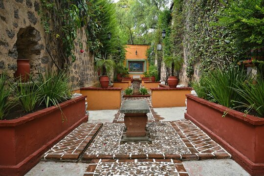 Semi-enclosed Roman Garden with classical statues and amphorae of the Spanish Colonial style ex Hacienda San Gabriel de Barrera in Guanajuato Mexico.
