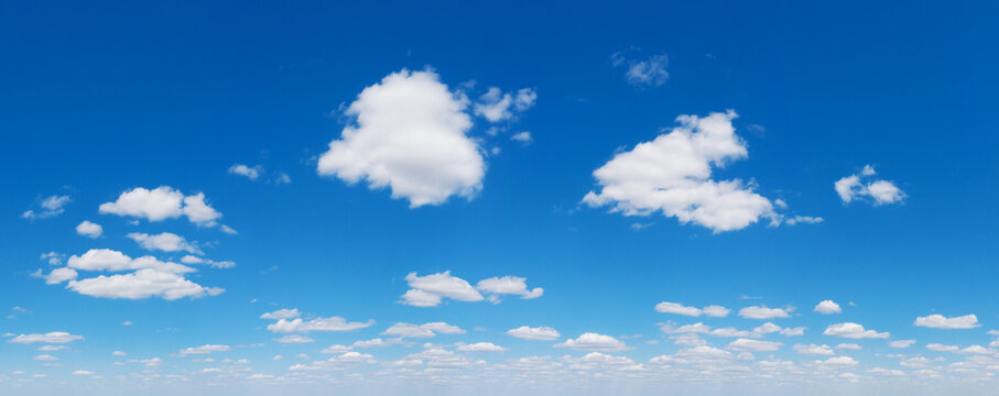Blue Sky background with tiny Clouds. Panorama background