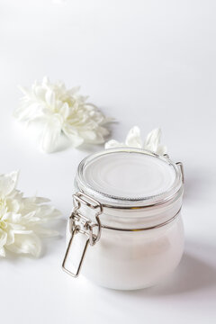 natural organic cosmetics with herbs for baby on white background