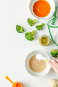 cooking vegetable puree for baby on white background top view