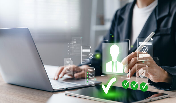 Hr reviewing  employee profile with AI verification.