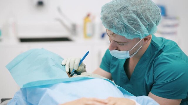 Professional male surgeon in sterile scrubs carefully performing a delicate surgical procedure on a patient's eye in a modern hospital operating room
