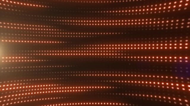 Warm orange LED dot tunnel with glowing rows and soft lens flare, creating an abstract futuristic technology background.