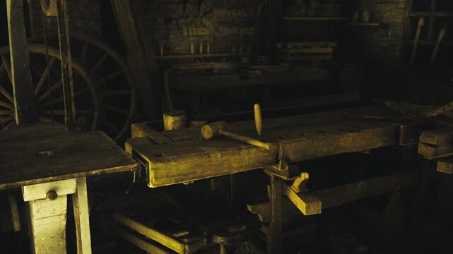 Moody woodworking bench with hand tools and wood shavings, old vise and plane resting on worn surface, warm spotlight creating dramatic shadows, atmosphere