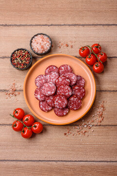 Slices of smoked salami for sandwiches or a lunch spread. Salami slices