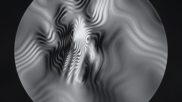 Knife Edge Schlieren Imaging of Invisible Rising Heat Plumes, Monochrome Seamless Loop in bright silver tones