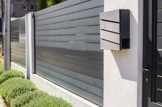 Modern fence with aluminum or metal shutter

