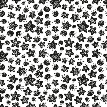 Seamless ditsy floral pattern with small monochrome black and white hand drawn wildflowers. Playful retro summer cottagecore botanical design