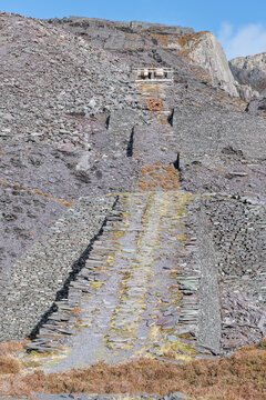 Slate spoil heap and ruins of disused Dinorwig Slate Quarry , Gwynedd, Wales,  Cymru, UK, GB