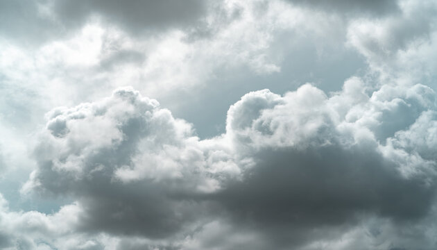 Overcast sky. Dark dramatic gray sky and white clouds before rain. Cloudy and moody sky. Storm sky. Cloudscape. Gloomy and moody background. Overcast clouds. Background for sad, lonely, and hopeless.