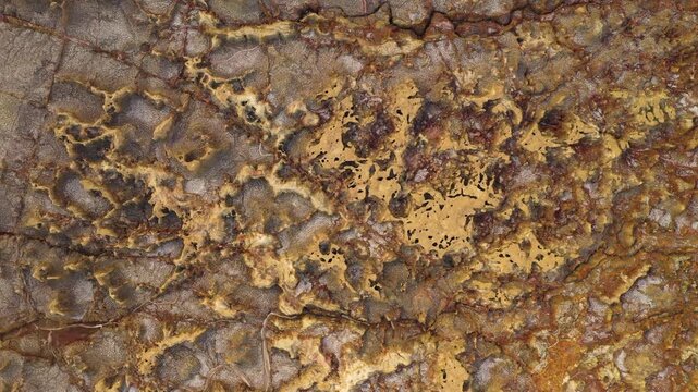 Aerial view of the colorful mineral deposits and salt formations of the Geothermal Area in Dalol, Afar, Ethiopia.