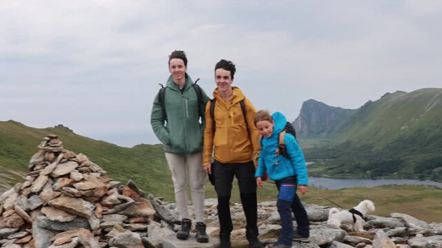 Mount Matind hike, family with children and pet dog, hiking Matinden peak summertime