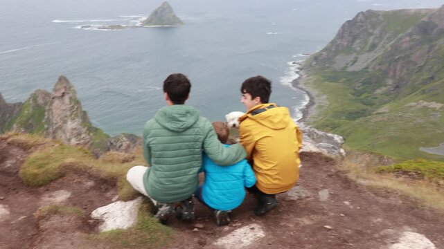 Mount Matind hike, family with children and pet dog, hiking Matinden peak summertime