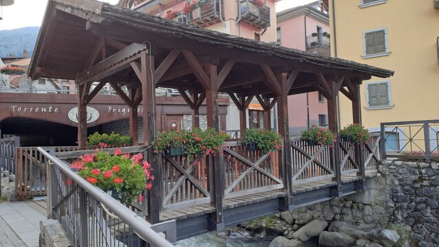 Ponte di Legno, Brescia, Italy - August 25, 2026 View of the wooden bridge over the Frigidolfo stream.