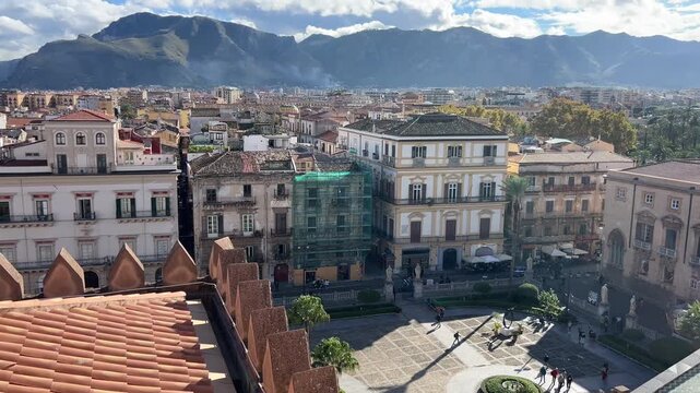 High angle view of the historic square and gardens from the roof of Palermo Cathedral. Scenic view of Piazza della Cattedrale from the rooftop, Sicily, Italy.