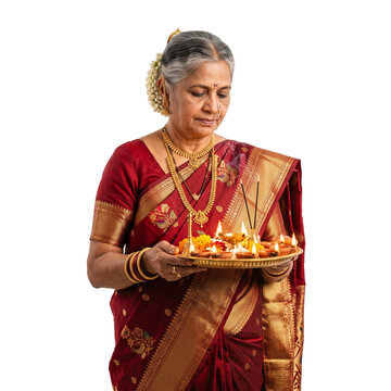  Diwali Portrait of Elderly Woman in Red Saree Offering Prayers with Aarti Thali on Transparent Background