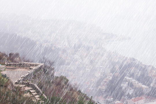 Autumn rain, the weather, the texture of falling drops against the backdrop of nature.