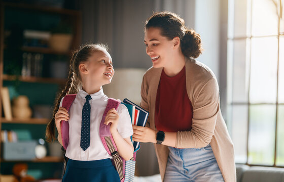 Happy Mother Sending Daughter to School, Back to School Morning