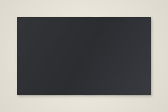 A solid dark rectangular shape centered on a neutral off-white background