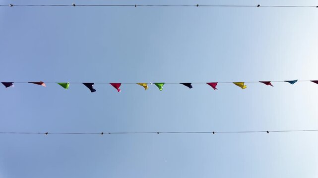 Colorful bunting flags moving in the wind