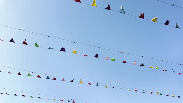 Colorful bunting flags moving in the wind