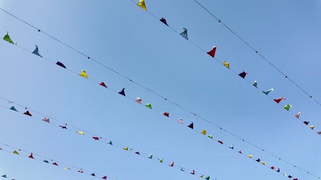 Colorful bunting flags moving in the wind