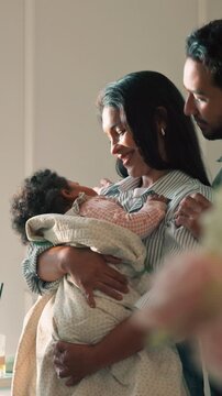 Parents, baby and swaddle with love in home for comfort, rest or peaceful sleeping time together. Mom, dad and child asleep with support or embrace for gentle parenthood, security or safety in house