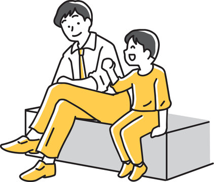 座って子供の話を聞くビジネスマン