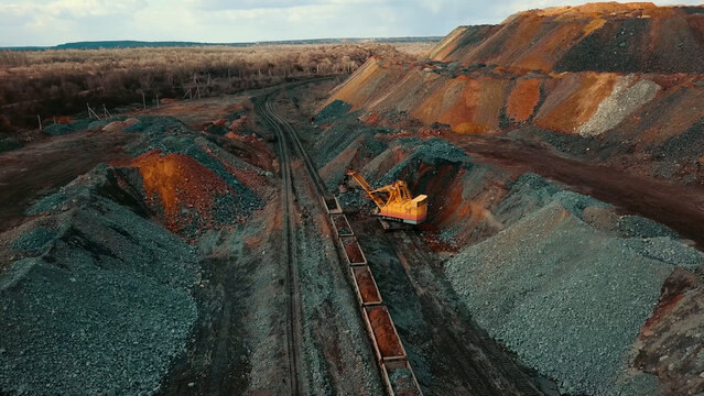 Iron ore quarry loading and transportation, aerial view
