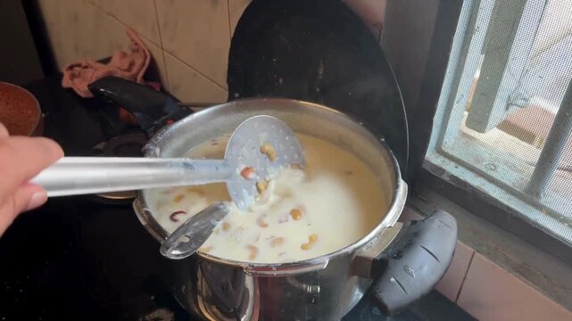 Stirring payasam dish