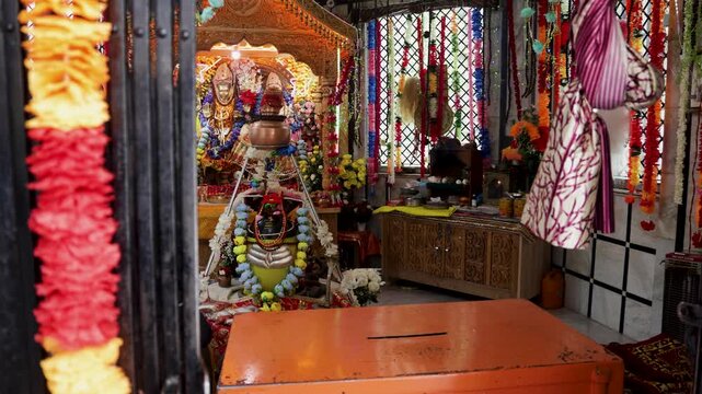 holy Shiva Lingam Adorned With Fresh Flowers During Hindu Religious shivaratri Worship