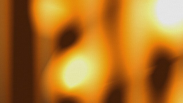 Orange gold gradient crumpled texture with grainy effect for abstract background design