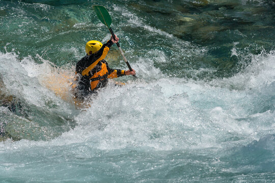 Zabljak, Zabljak Municipality, Montenegro - 29 July 2005: View of a kayaker navigating the turbulent white water of the Tara River in the Tara River Canyon.