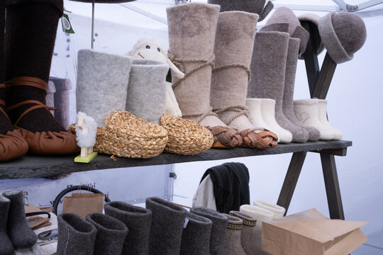 Traditional Handmade Felt Boots and Woven Bast Shoes at Market