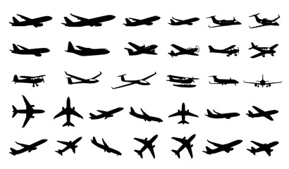 Fototapeta premium Collection of various airplane silhouettes showing different types of aircraft in flight and from multiple angles