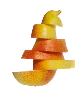 Sliced pear fruits flying isolated on white background, with clipping path