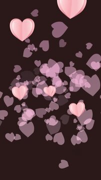 Animation of multiple pink hearts on black background
