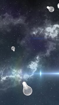 Animation of light bulb icons over light trails and stars on black background