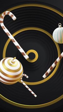 Christmas baubles, gifts and candy canes over gold concentric rings on black background