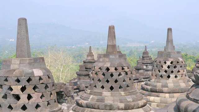 Stone stupas at borobudur temple in indonesia